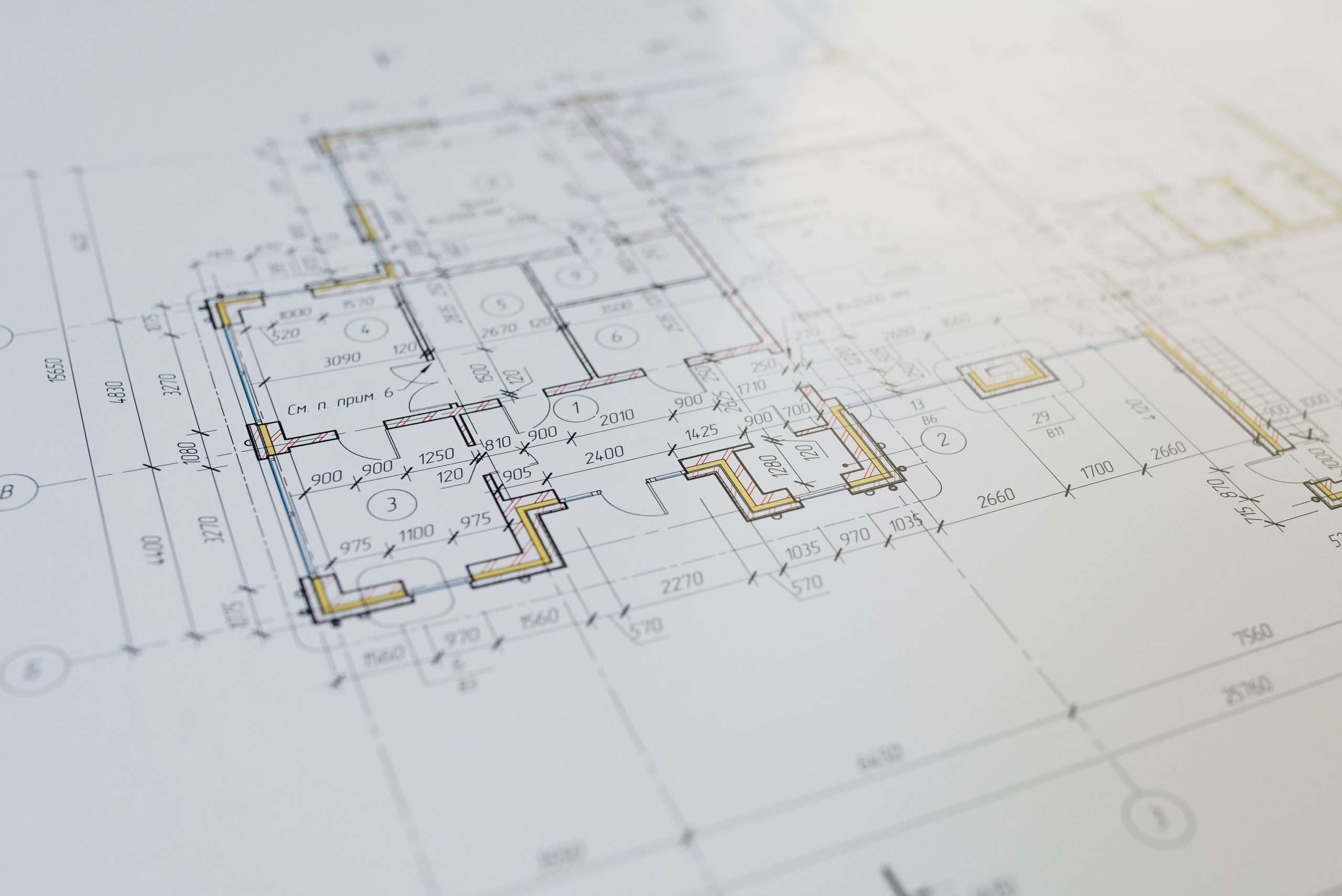 Architectural floor plan with pencil and ruler