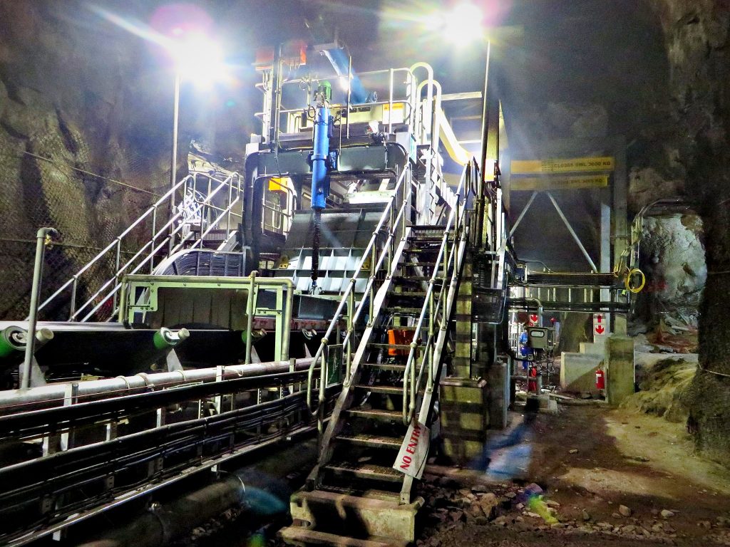 Conveyor and steel walkway structure at a mining infrastructure site