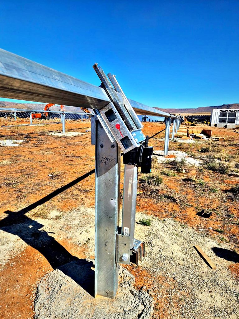 Mooiplaats solar PV project: Close up of a tracker drive and galvanised support post at the Mooiplaats solar PV plant